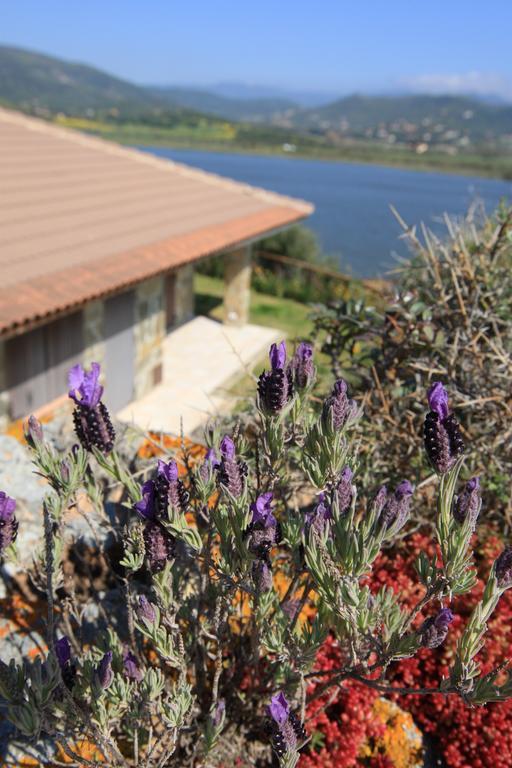 Case Sul Mare Residenze Di Bes Chia Exterior photo
